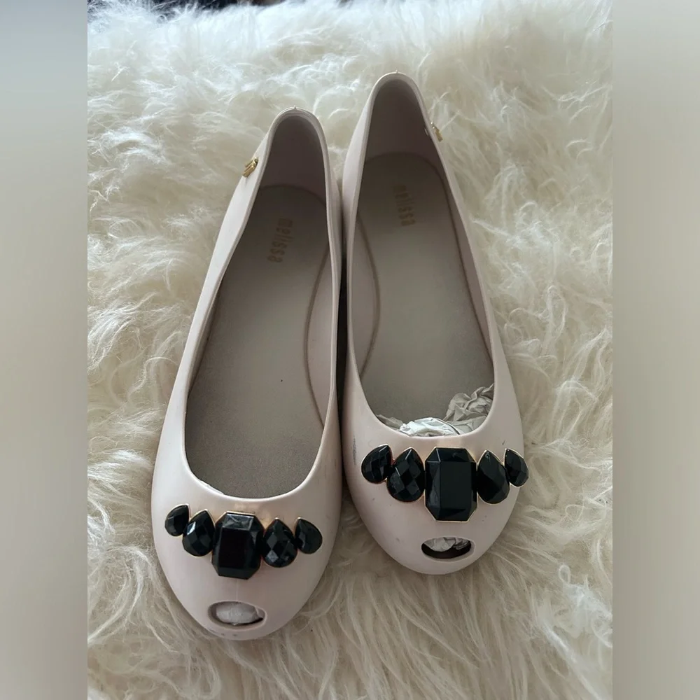 Mini Melissa excellent worn